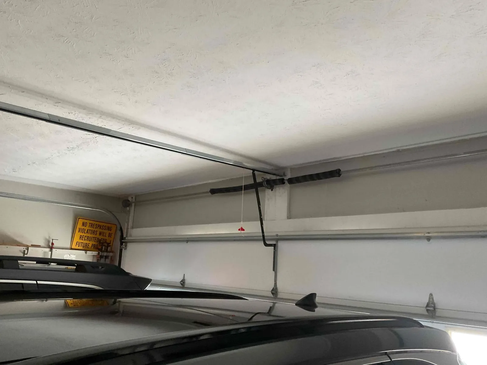 Garage door spring system before replacement